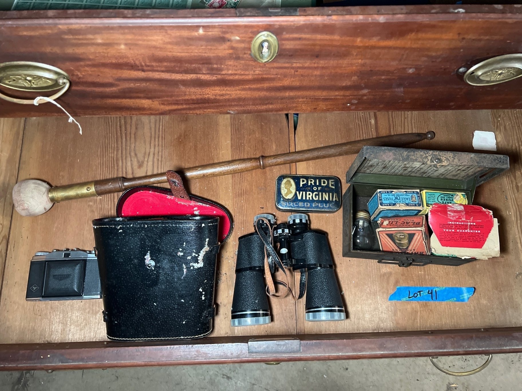 Vintage binoculars, fuse boxes, tobacco tin, and first-aid kit collection - image 1 of 9
