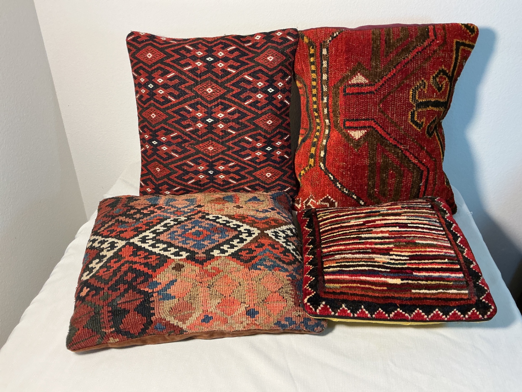 4 vintage Rug covered pillows - image 1 of 7