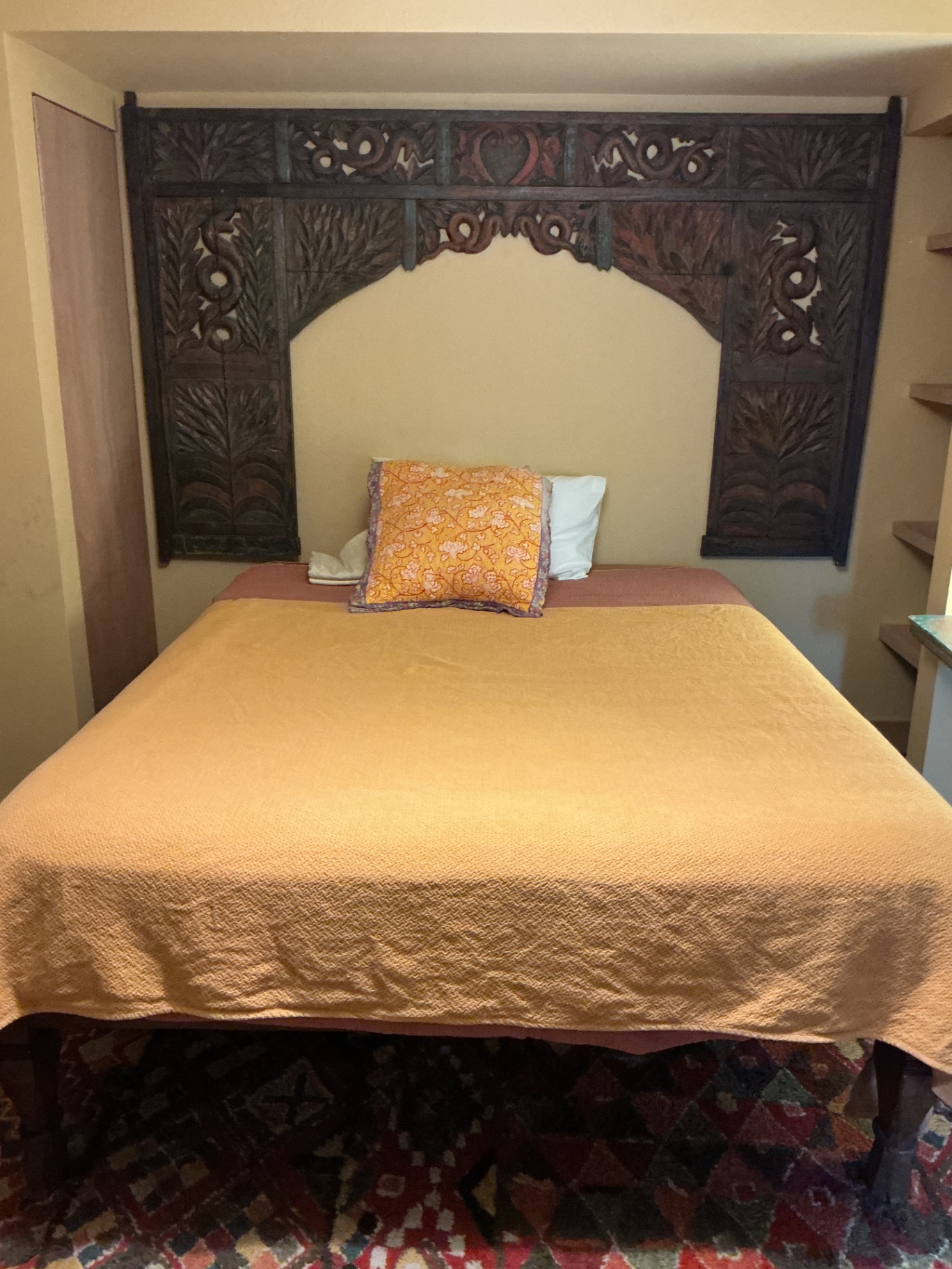 Carved wooden bed frame with memory foam mattress - image 1 of 9