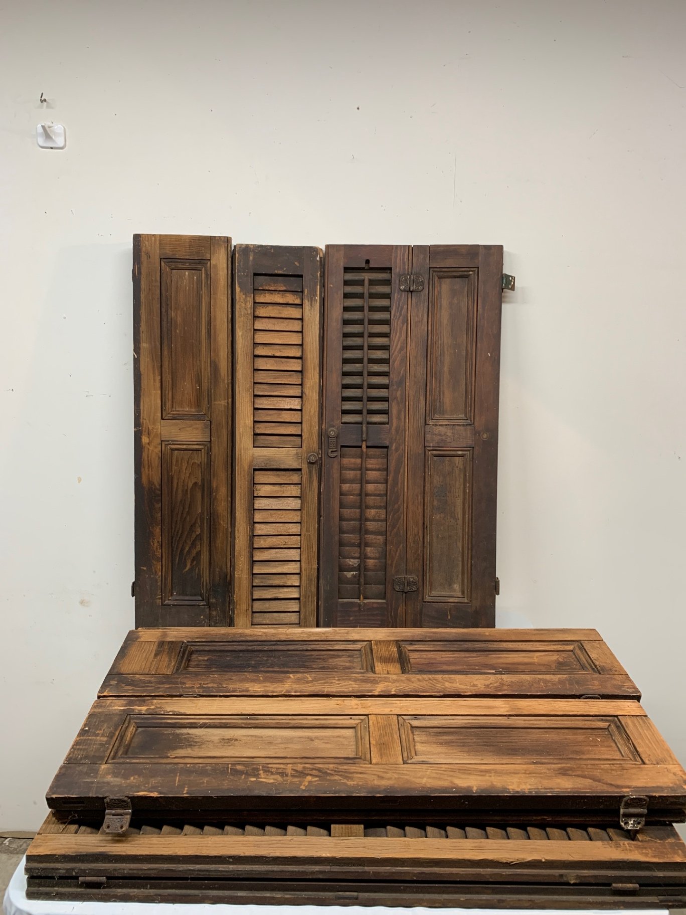Vintage wooden shutters with hardware - image 1 of 3