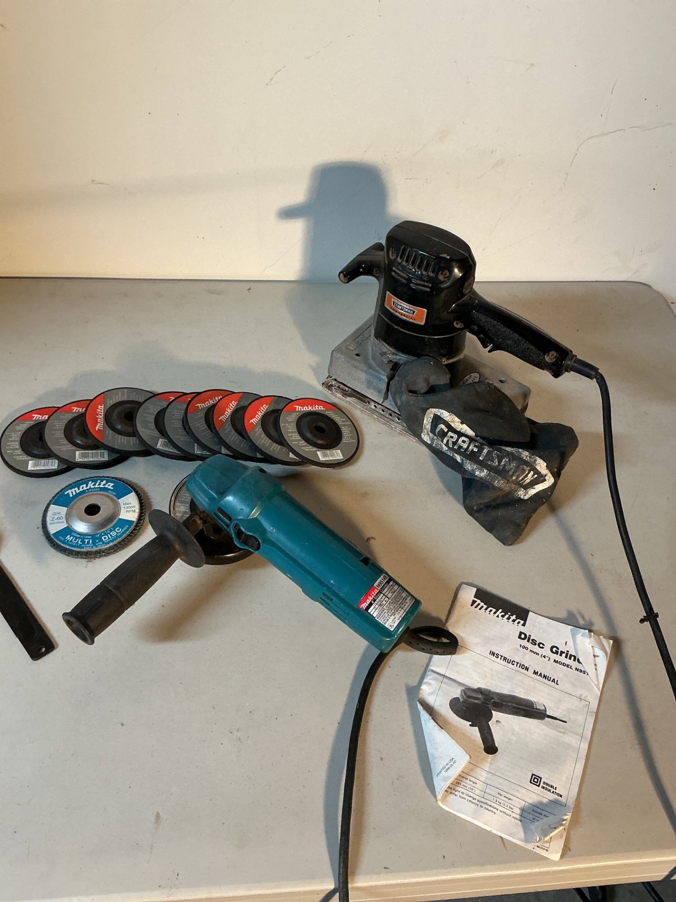 Makita 4-inch Disc Grinder and Craftsman belt sander - image 1 of 4