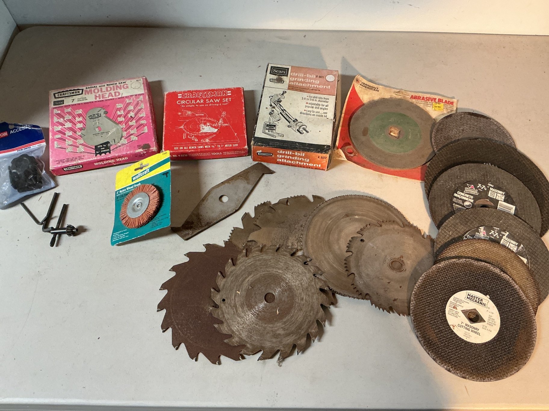 Assorted saw blades, grinding wheels, and drill accessories - image 1 of 3