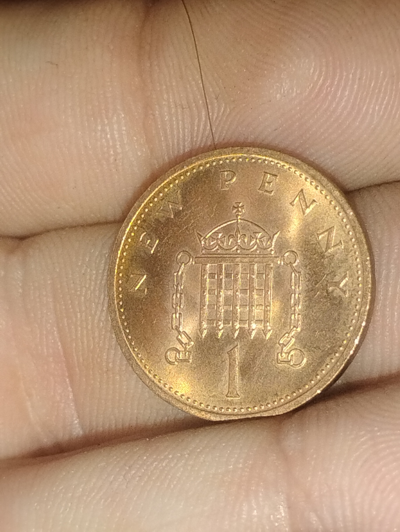 Elizabeth II copper coin with crowned emblem on reverse - image 2 of 2