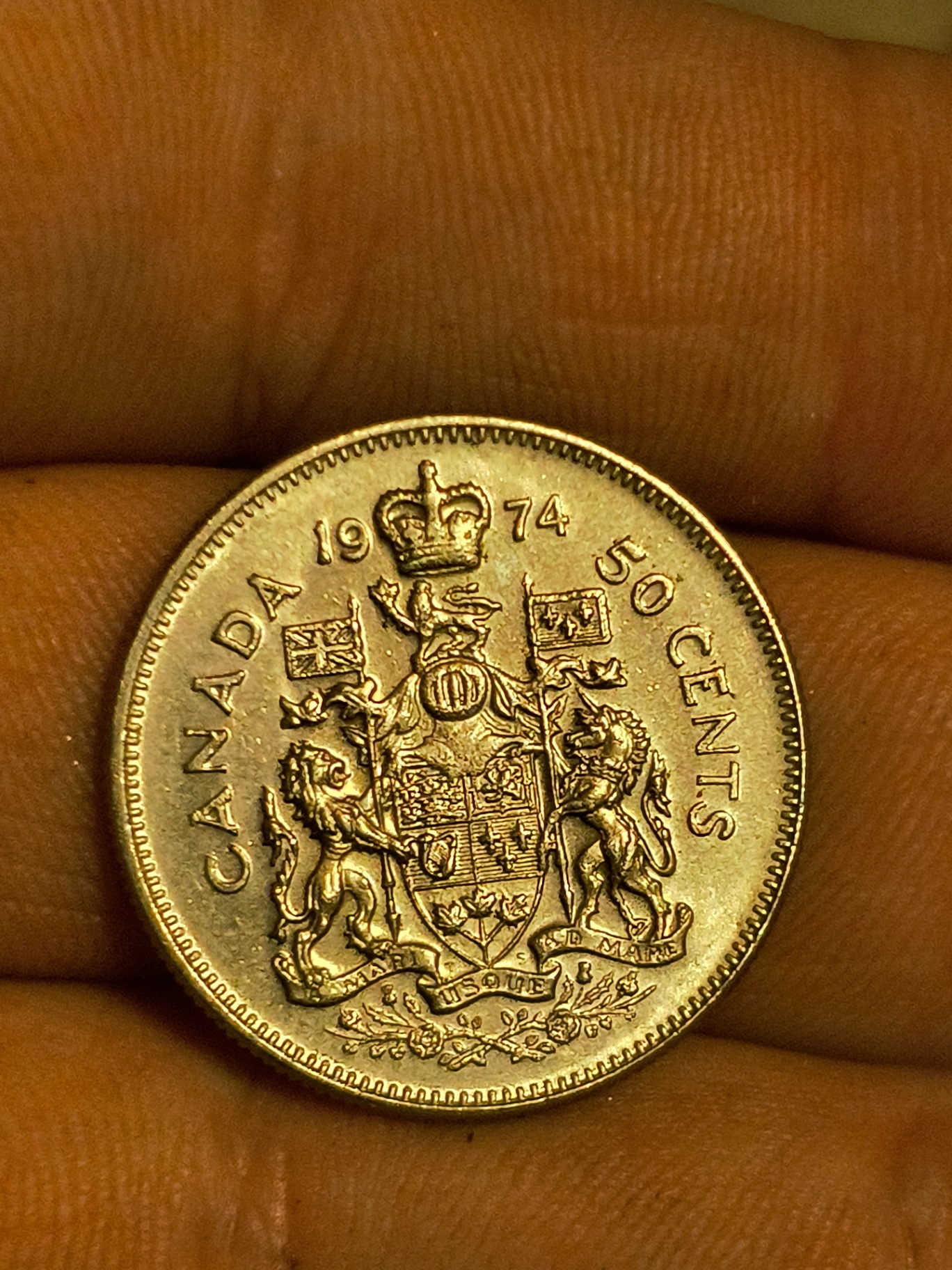 Canadian 50-Cent Coin (1974) with Queen Elizabeth II and Coat of Arms - image 2 of 2