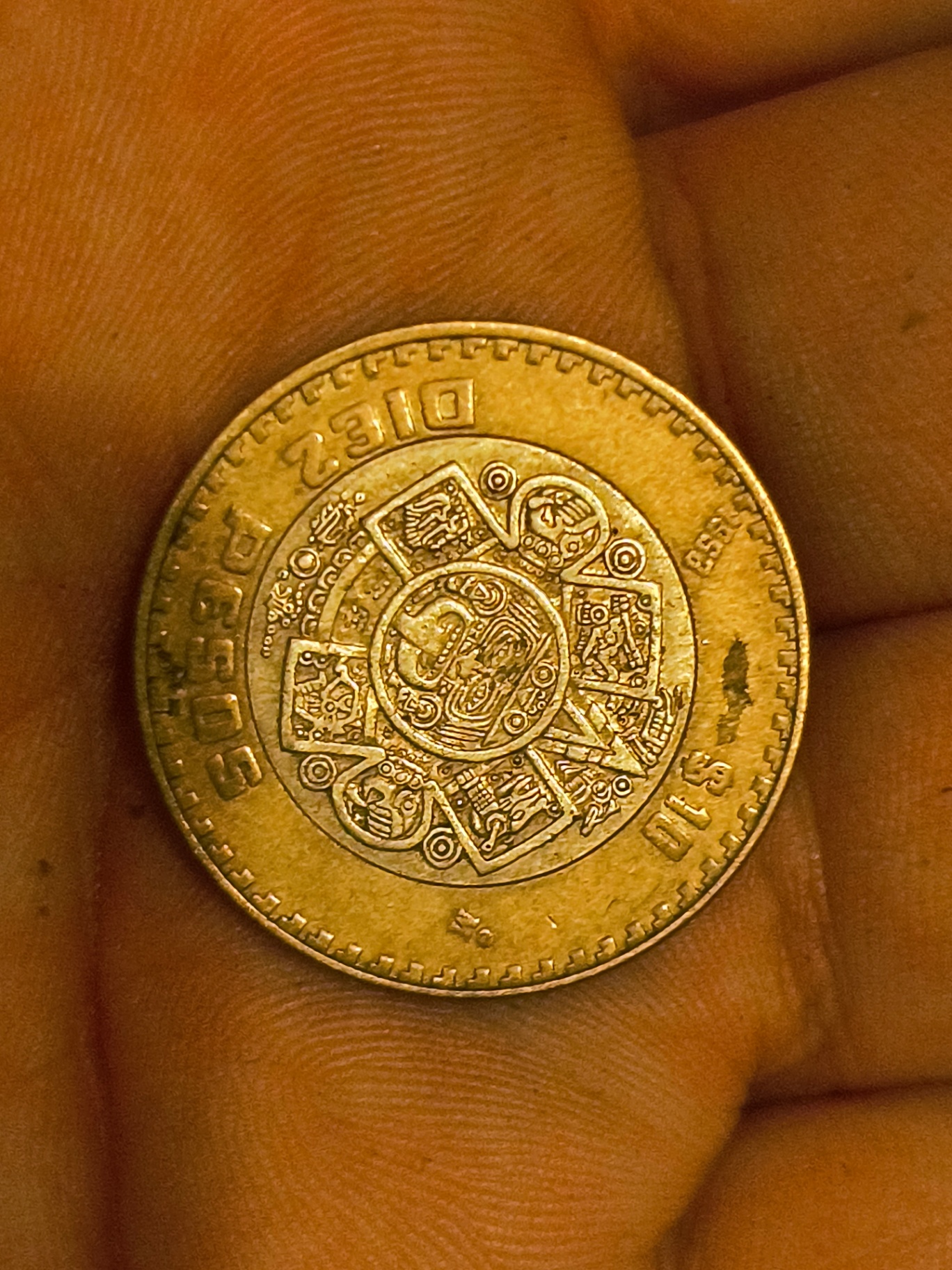Mexican coins – bi-metallic ringed coin and Aztec calendar coin - image 2 of 2