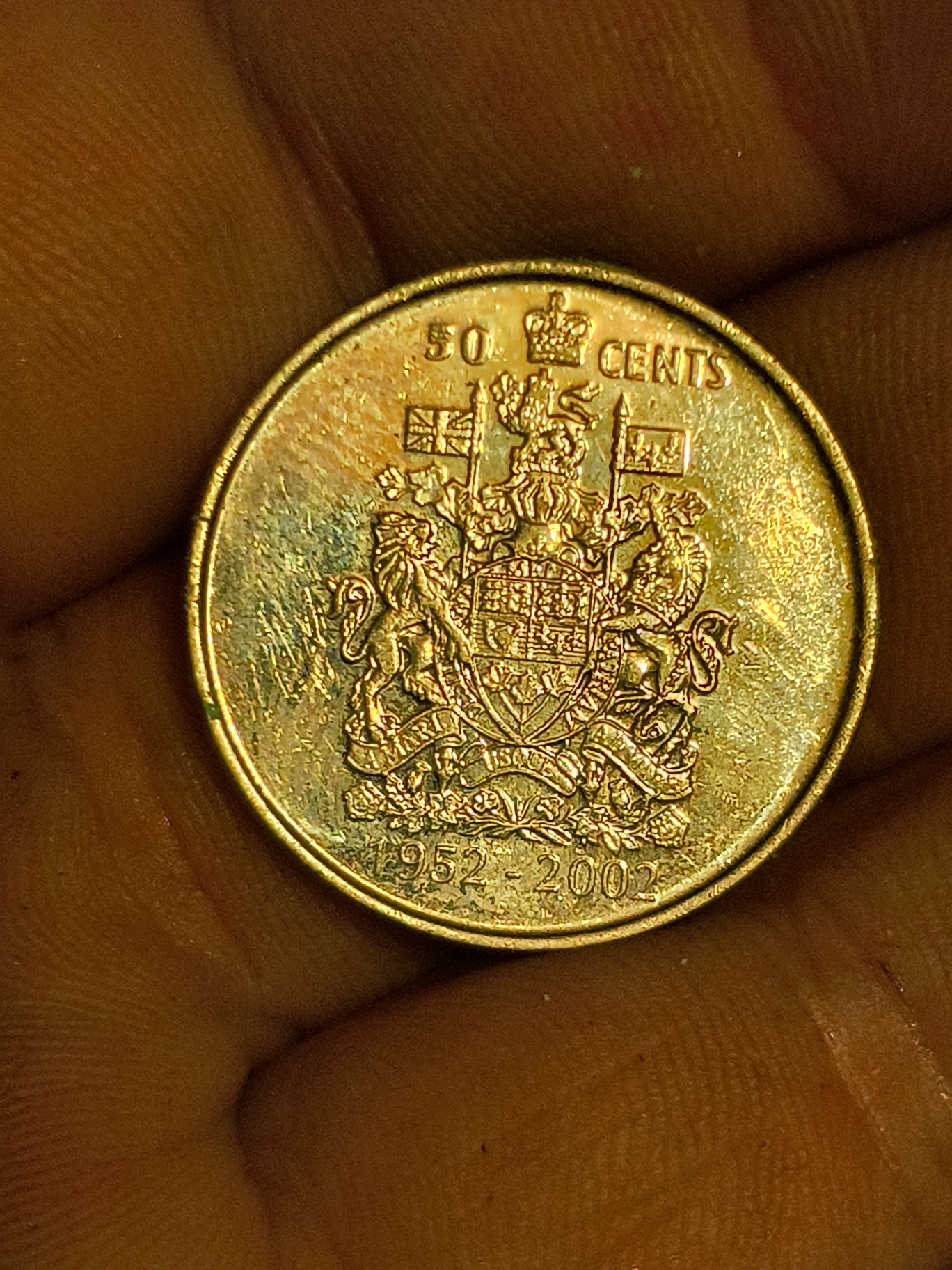 Canadian coins: Elizabeth II portrait coin and 50-cent commemorative coin - image 2 of 2