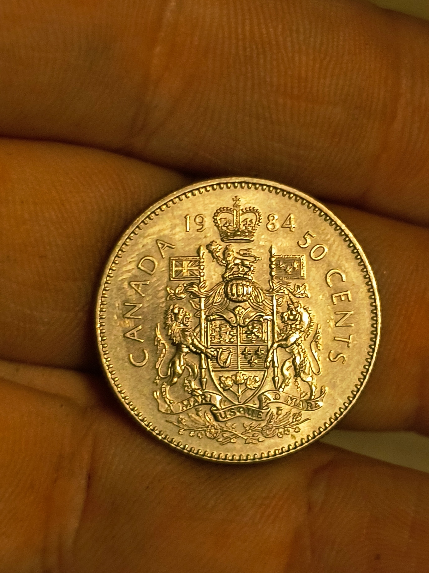 Canadian 50-Cent Coin (1984) with Queen Elizabeth II and Coat of Arms - image 2 of 2