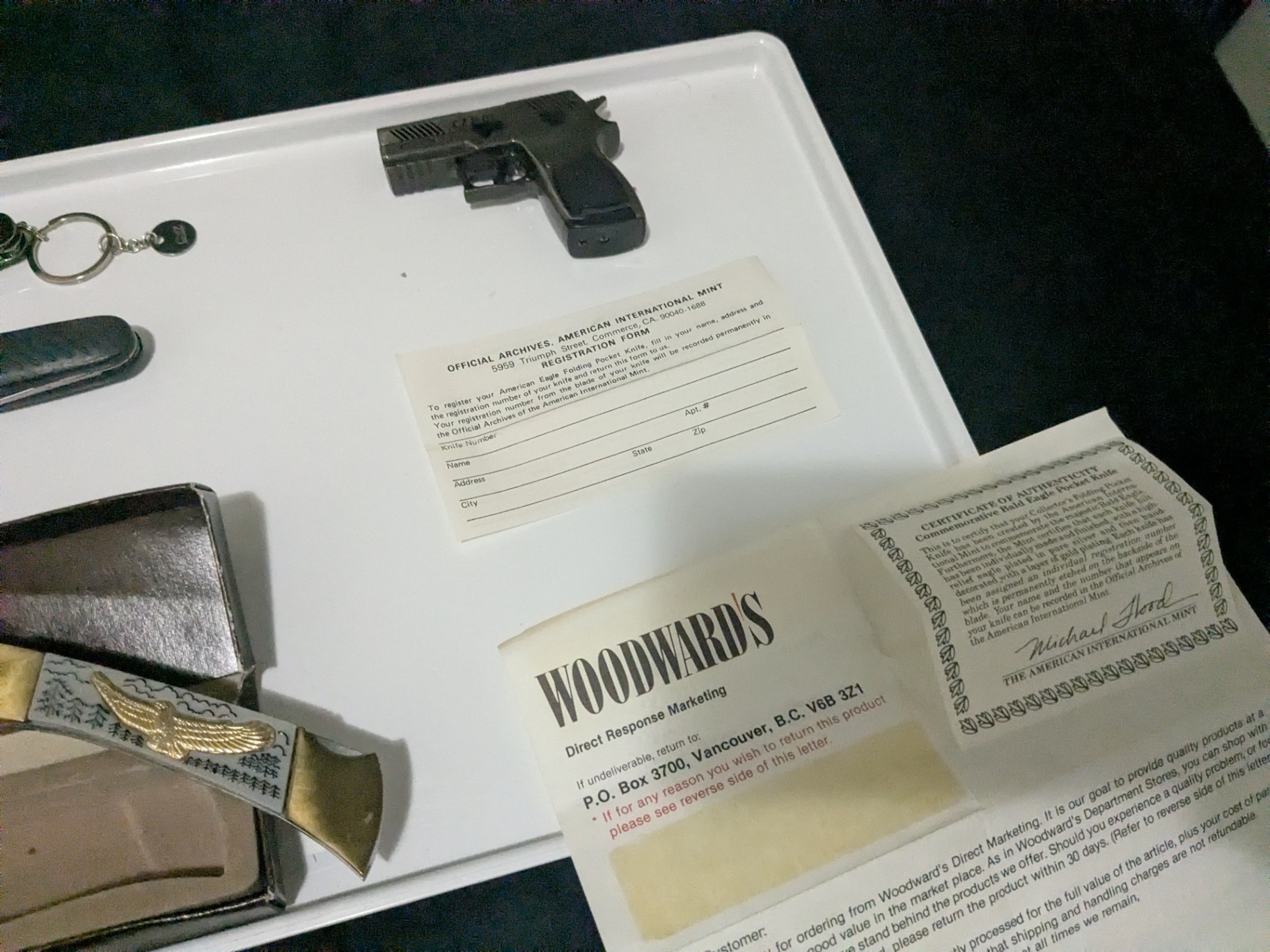 Mixed Outdoor & Collectible Lot – Knife, Flashlight, Tactical Bag, Replica Pistol Torch Lighter, Multi-Tools & Vintage Paperwork - image 5 of 12