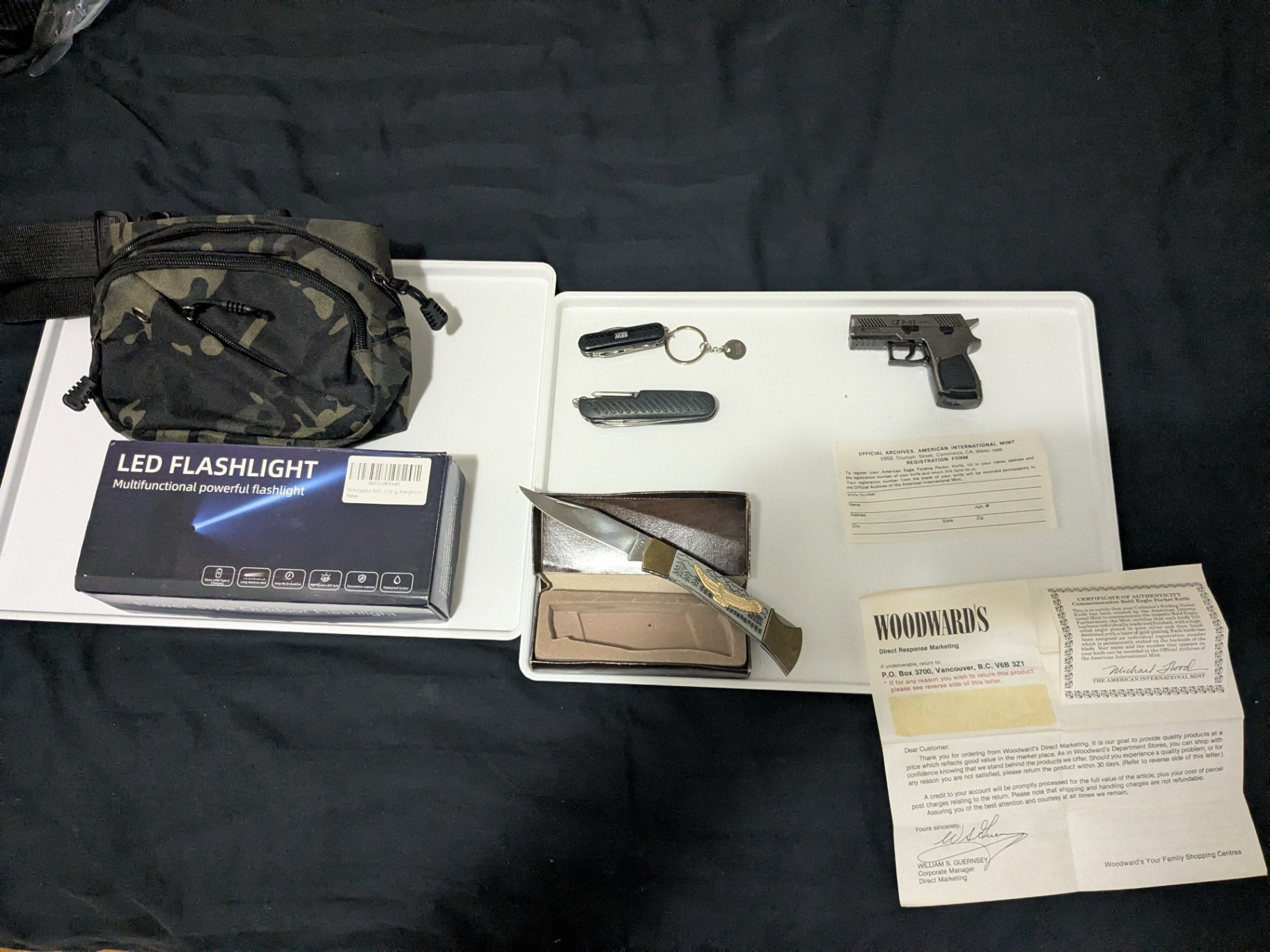 Mixed Outdoor & Collectible Lot – Knife, Flashlight, Tactical Bag, Replica Pistol Torch Lighter, Multi-Tools & Vintage Paperwork - image 11 of 12