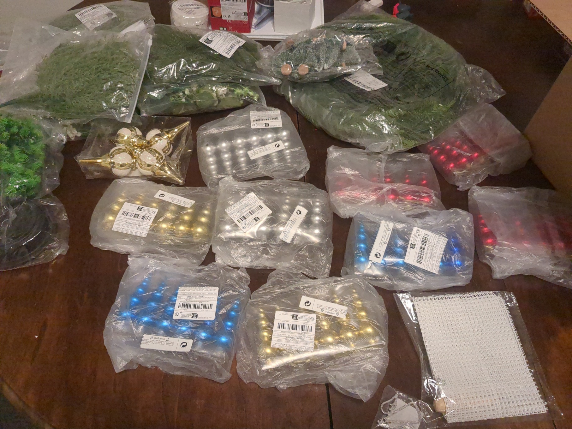 Christmas decorations and plastic green tree decorations  - image 1 of 10