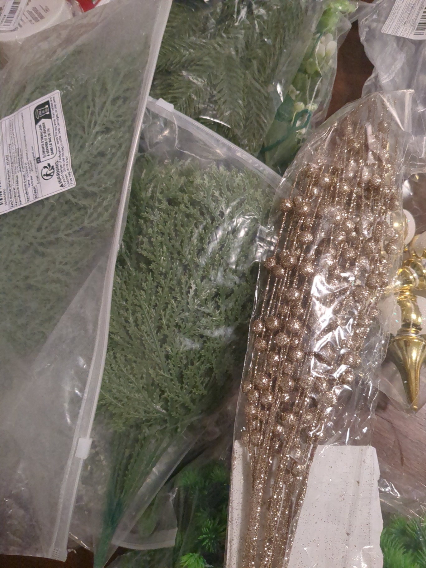 Christmas decorations and plastic green tree decorations  - image 5 of 10