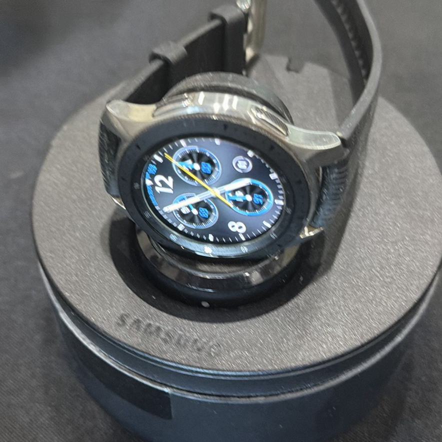 Samsung Galaxy III round smart watch with charging dock and accessories - image 7 of 9