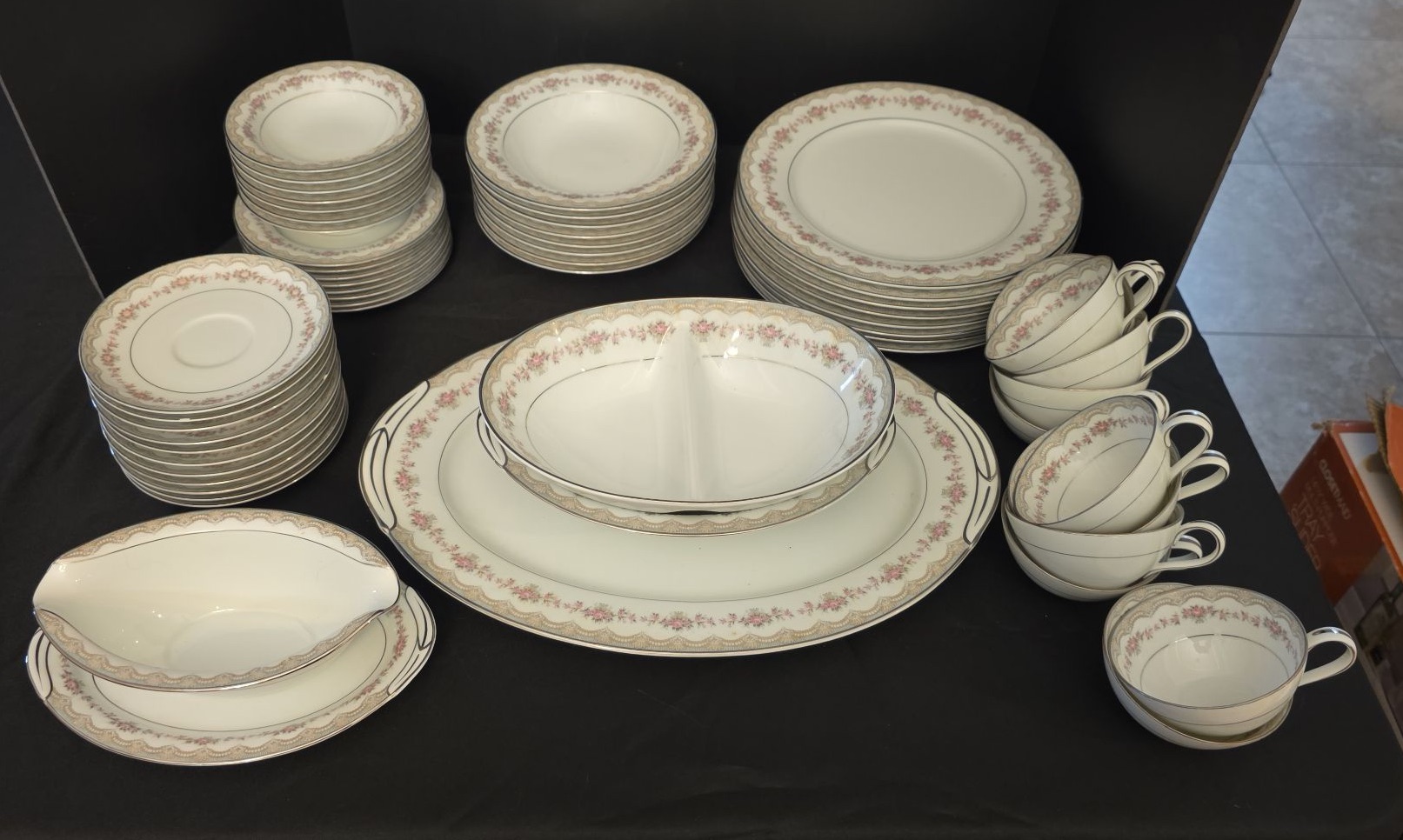 Porcelain dinnerware set with pink floral border and gold trim - image 1 of 6