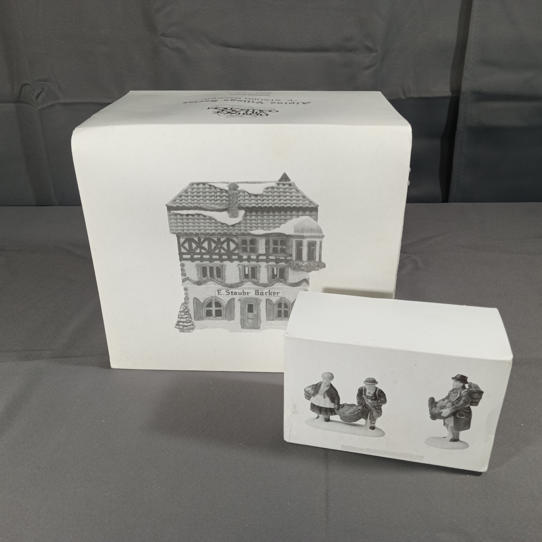  Dept. 56 Alpine Village Series - Buying Baker's Bread + E. Staubr Backer - image 1 of 7