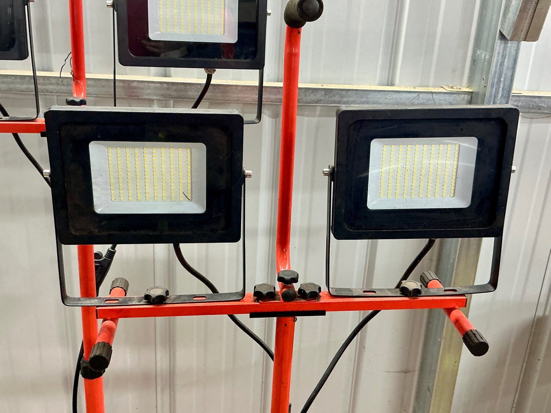 LED floodlights on red tripod stands - image 3 of 3