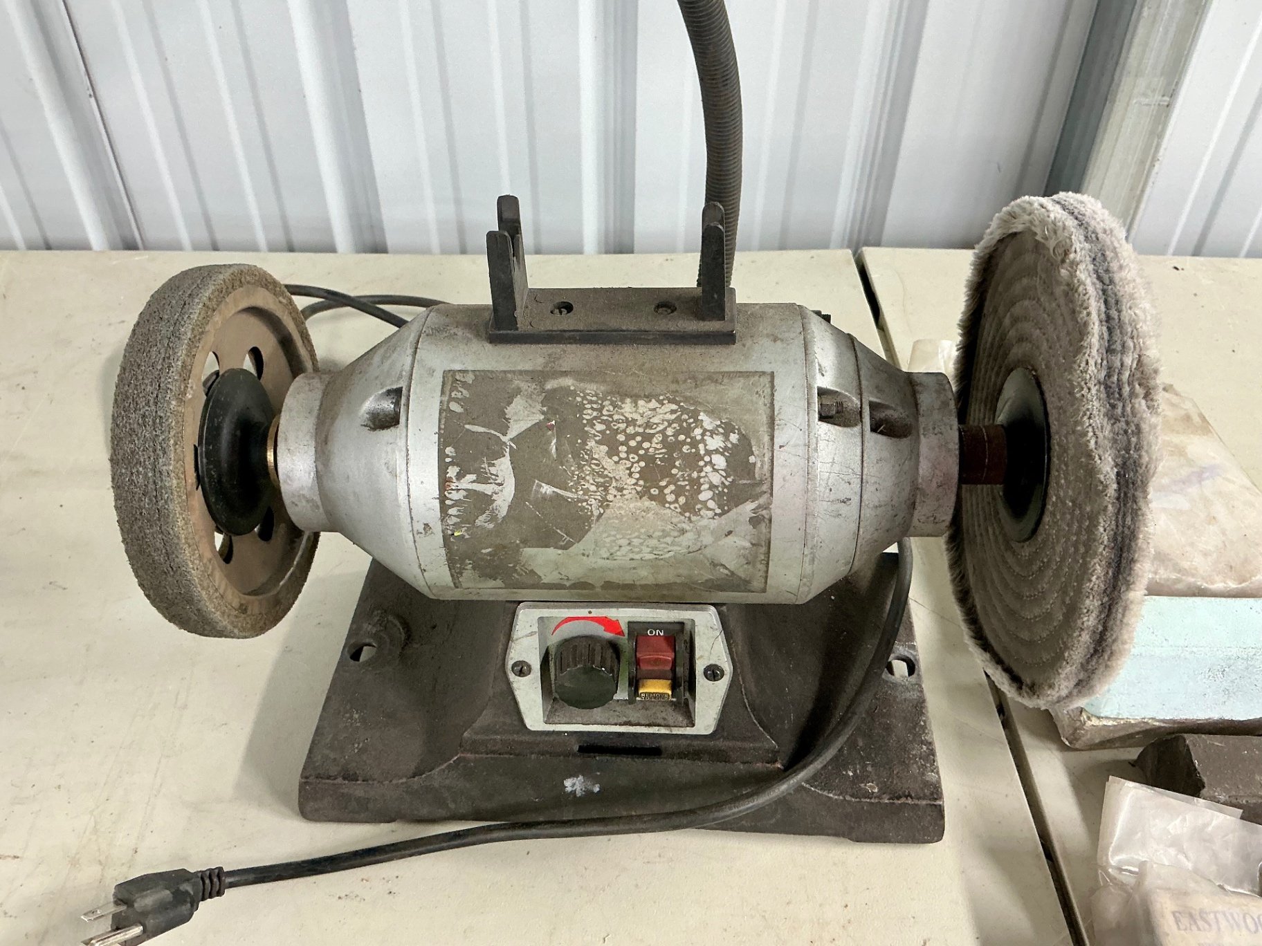 Bench grinder with buffing wheels and polishing compound - image 2 of 3