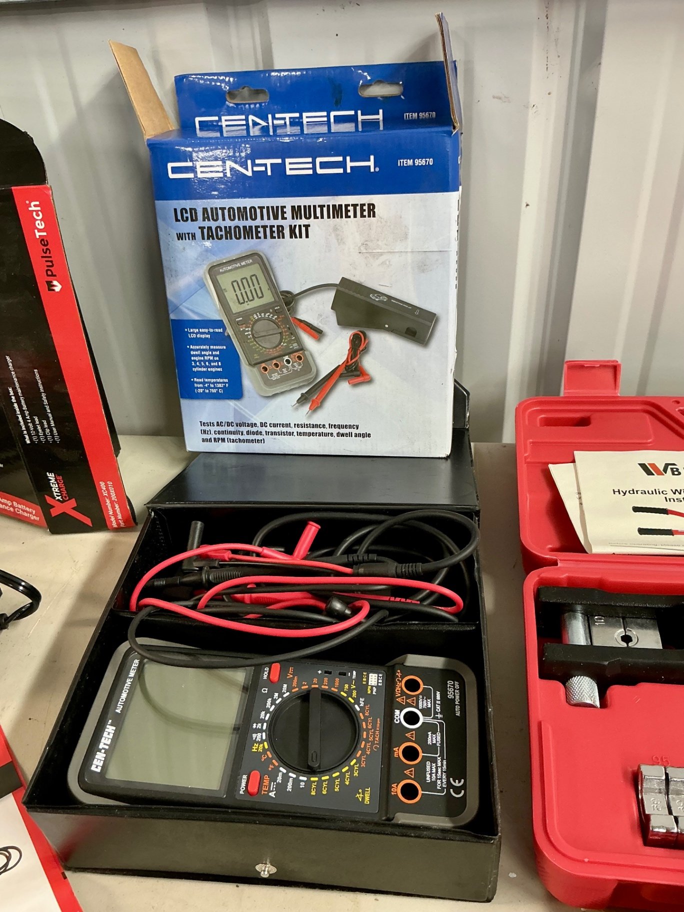 Automotive electrical tool kit with multimeter, battery charger, crimping tool, and socket set - image 4 of 6