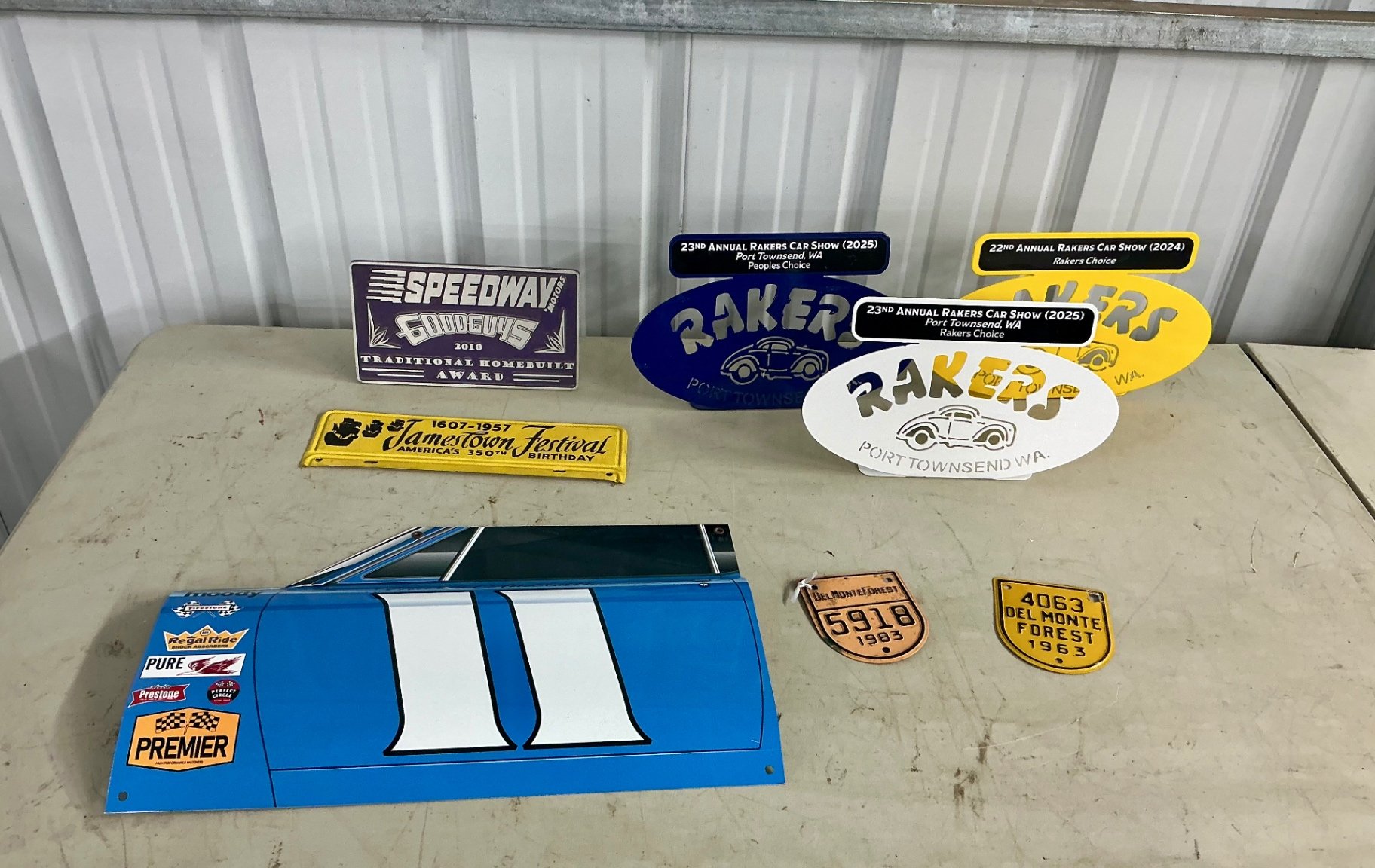 Racers memorabilia signs and a Mario Andretti decorative panel - image 1 of 6
