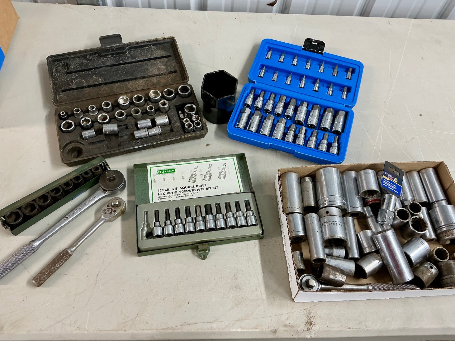Assorted 3/8-inch drive socket sets and bits - image 1 of 7