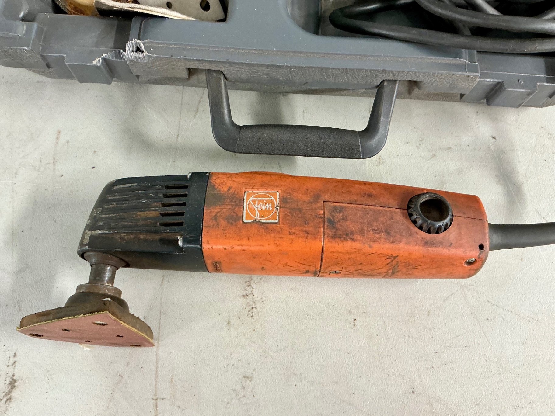 Multi-tool and blue Bosch palm router with accessories - image 2 of 5