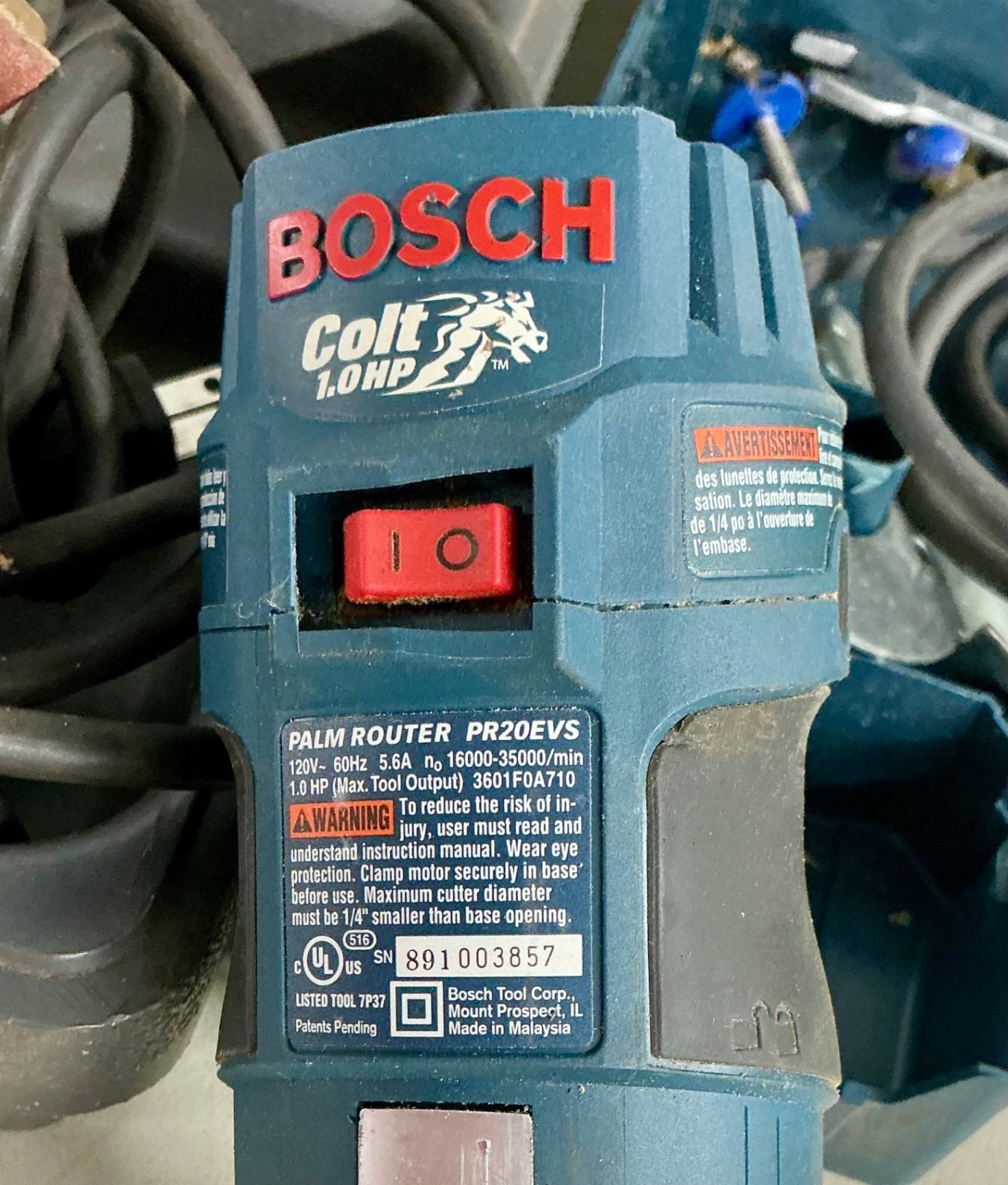 Multi-tool and blue Bosch palm router with accessories - image 5 of 5
