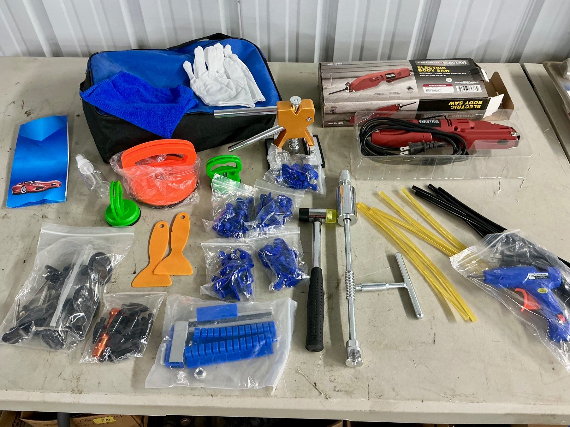 Electric body saw and Dent repair kit - image 1 of 4