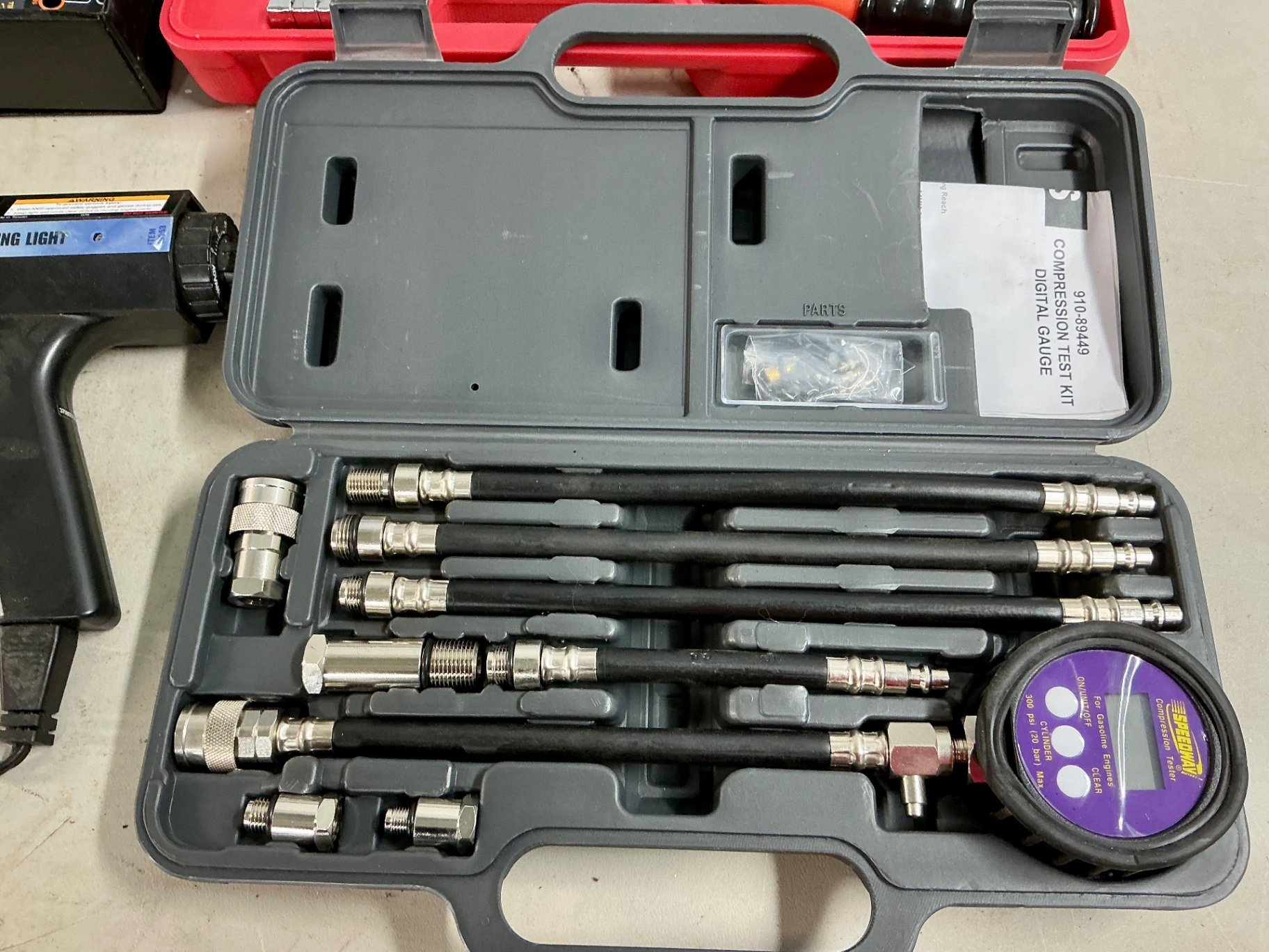 Automotive electrical tool kit with multimeter, battery charger, crimping tool, and socket set - image 2 of 6