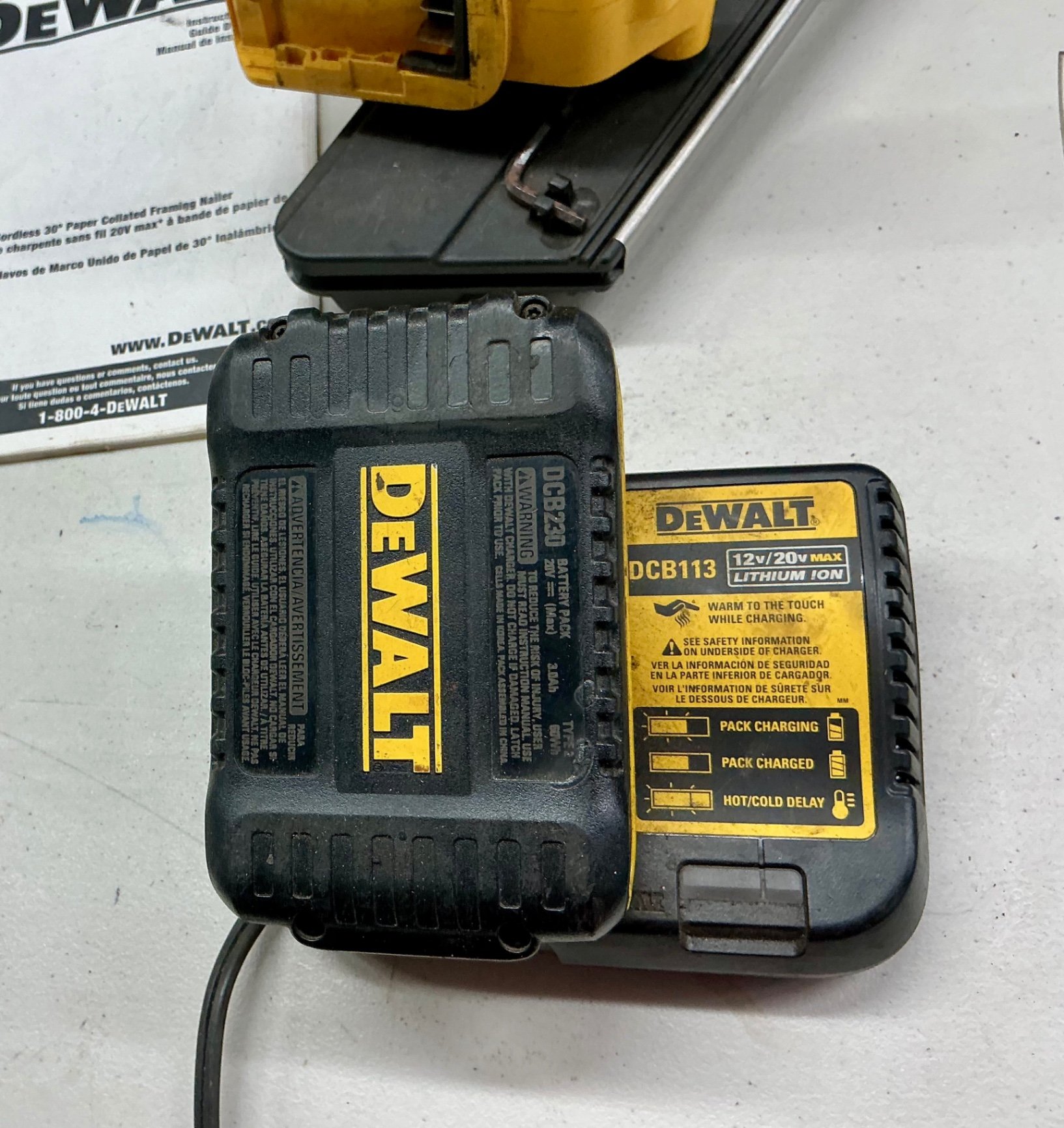 DeWalt 20V Max cordless framing nailer with charger, manual, and Paslode RoundDrive nails - image 2 of 5