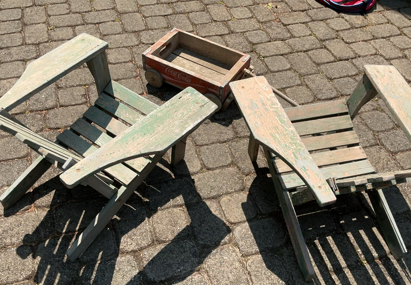 Two weathered green wooden chairs with Coca-Cola wagon and crate - image 2 of 6
