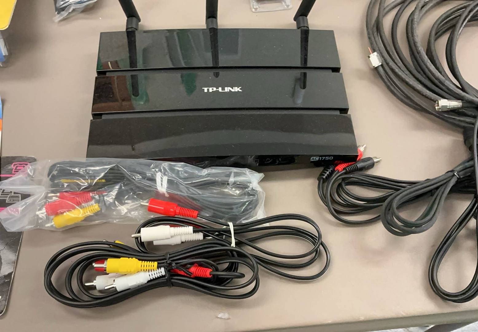 TP-Link Router with assorted AV cables and accessories - image 4 of 8