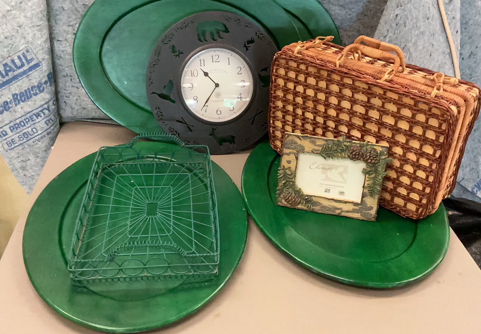 Green and natural home decor items: clock, platters, baskets, and framed Elements artwork - image 1 of 5