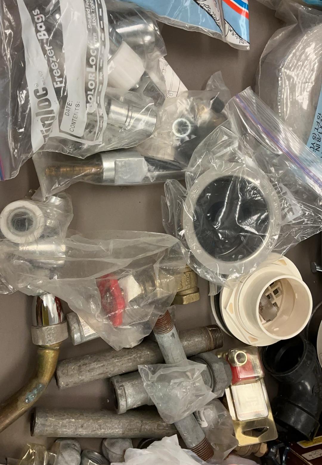 Assorted plumbing fittings, pipes, and fixtures - image 10 of 13