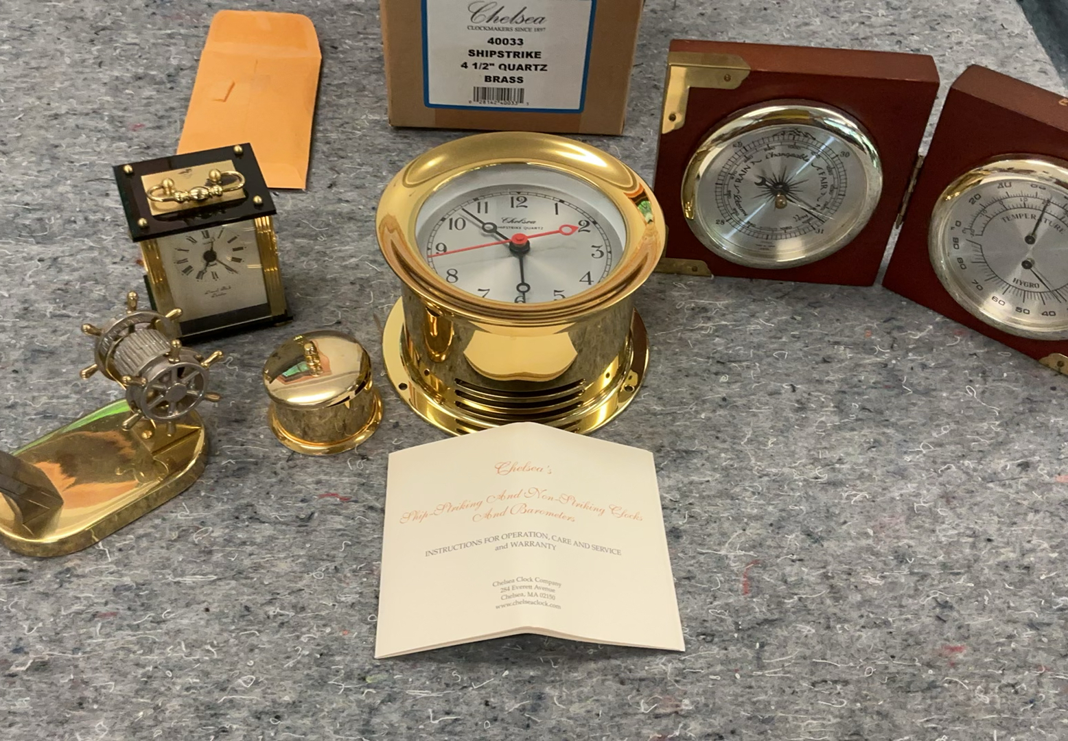 Brass Chelsea nautical clock set with barometers and ship wheel - image 1 of 5