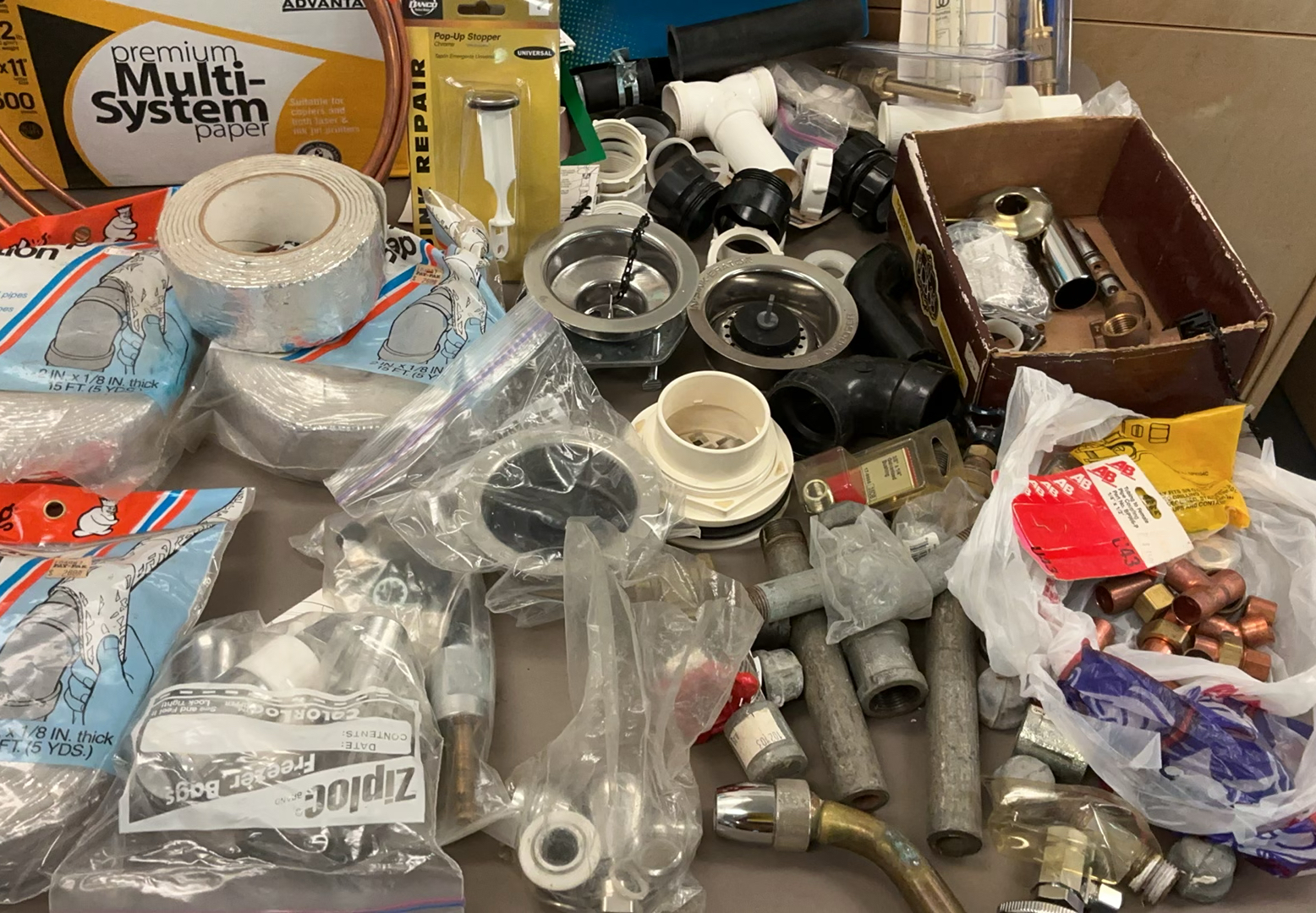 Assorted plumbing fittings, pipes, and fixtures - image 1 of 13