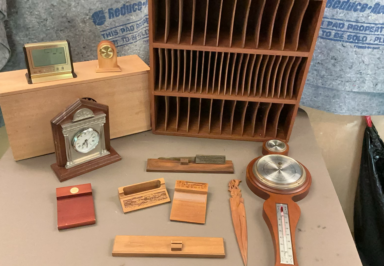 Assorted wooden desk clocks, organizers and carved boxes - image 1 of 7