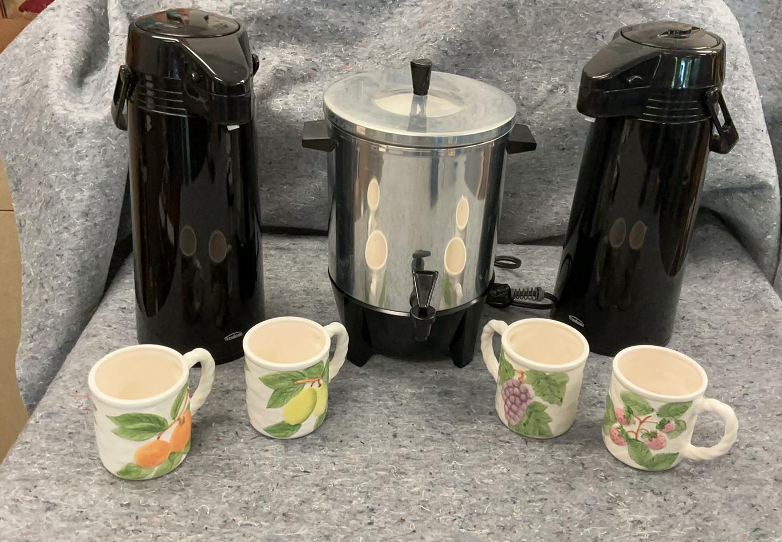Three beverage urns with fruit-pattern mugs - image 1 of 6