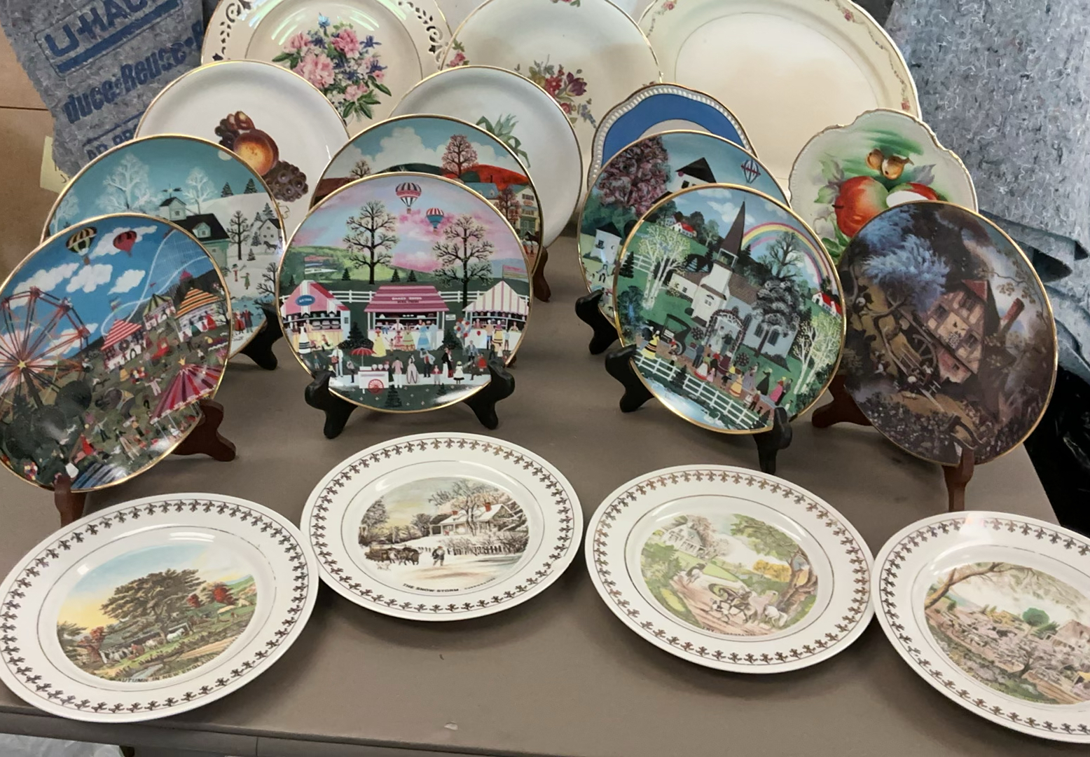 Assorted decorative porcelain plates with Currier & Ives and other motifs - image 1 of 20