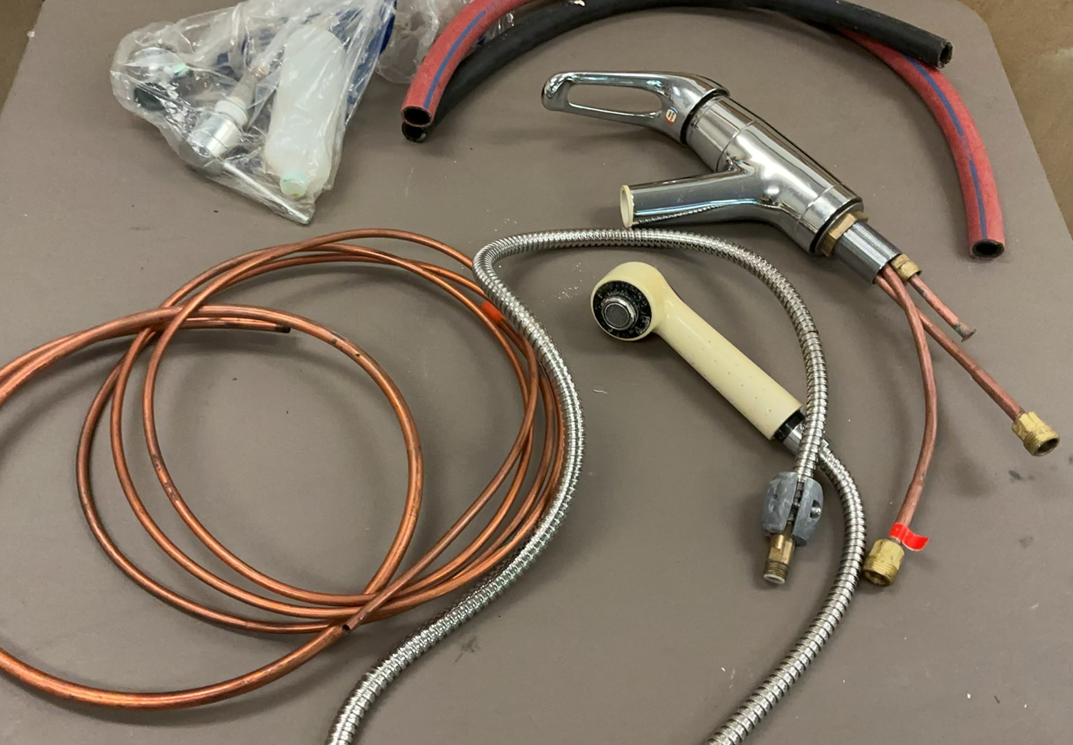 Assorted plumbing fittings, pipes, and fixtures - image 11 of 13