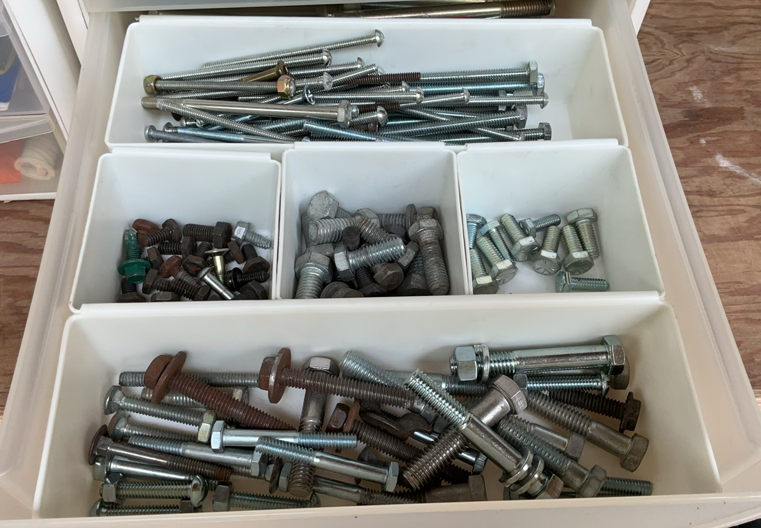Assorted hardware and fasteners in plastic drawers - image 3 of 17