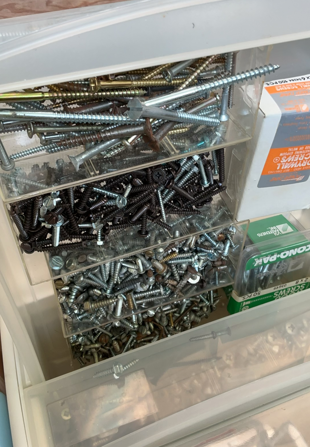 Assorted hardware and fasteners in plastic drawers - image 14 of 17