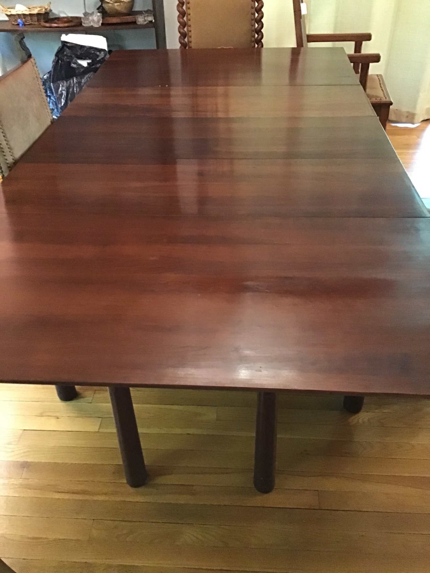Dark wood dining table with extension leaves 45x44 w/o leaves. 3 leaves total 41 1/2 . Size w leaves 86 1/2 x 44 - image 1 of 4