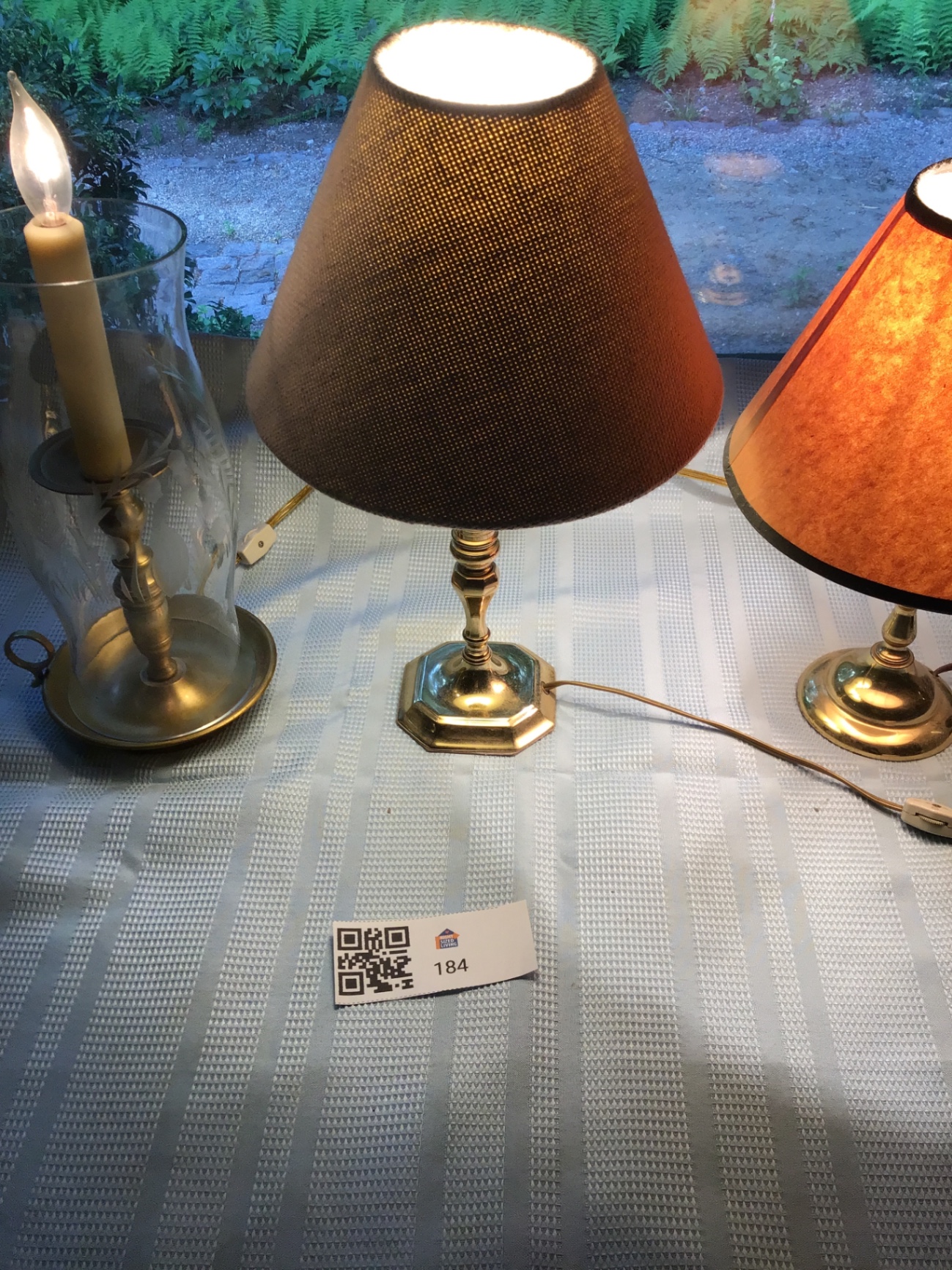 Two table lamps and a glass hurricane candle holder - image 1 of 2