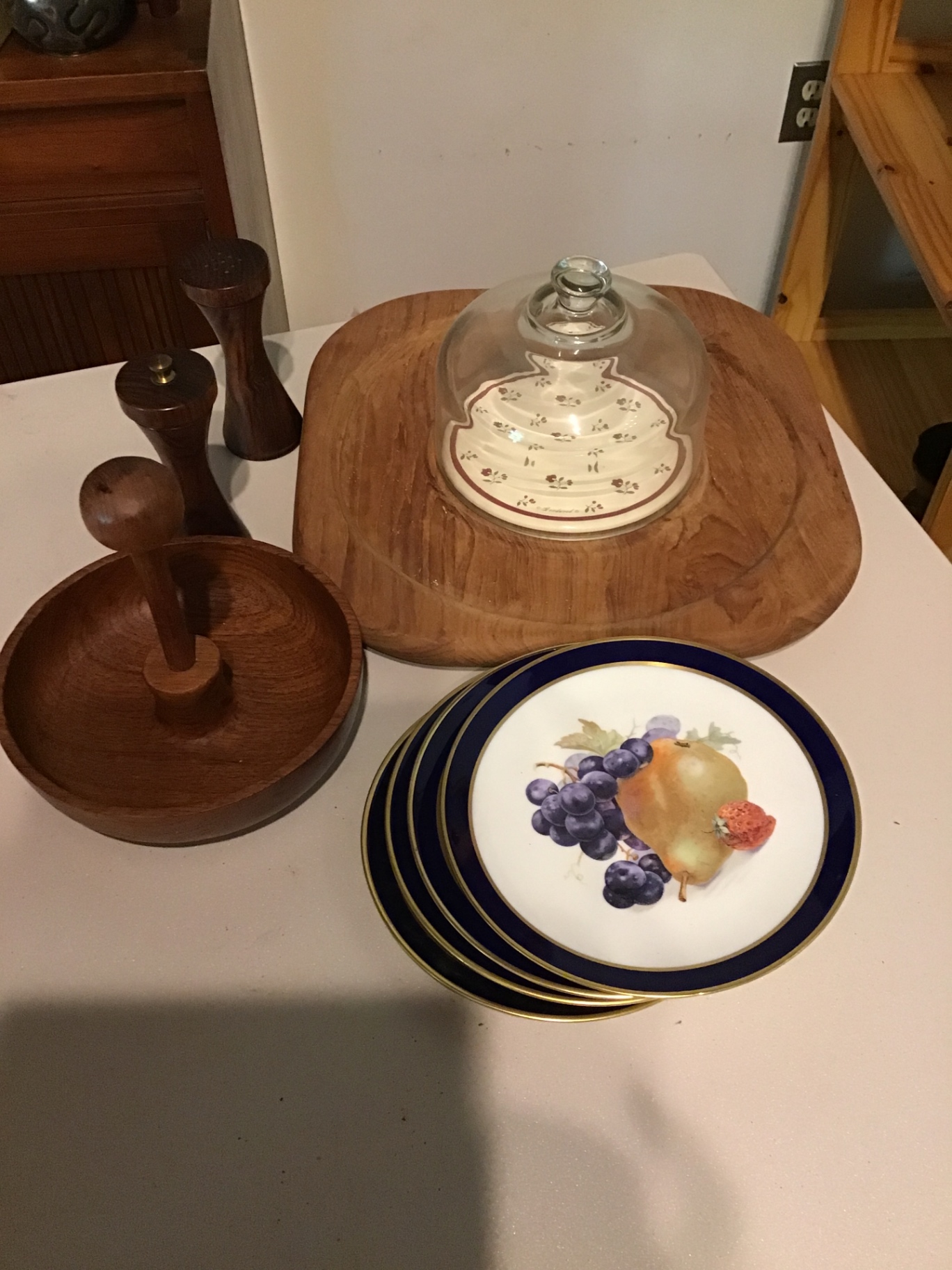 Fruit-patterned cobalt-rim plates with wooden cake stand and pepper mills - image 2 of 3