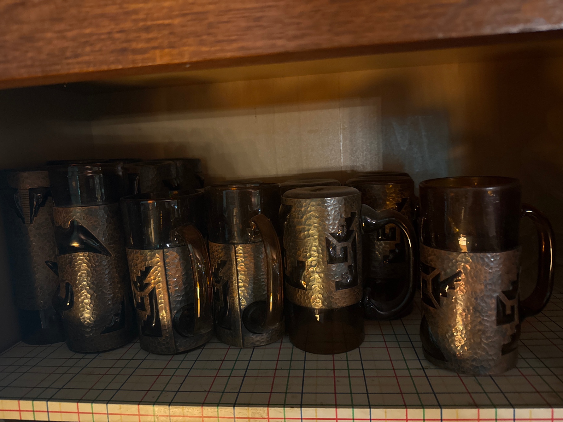 Hammered-metal beer steins with dark tops - image 2 of 4