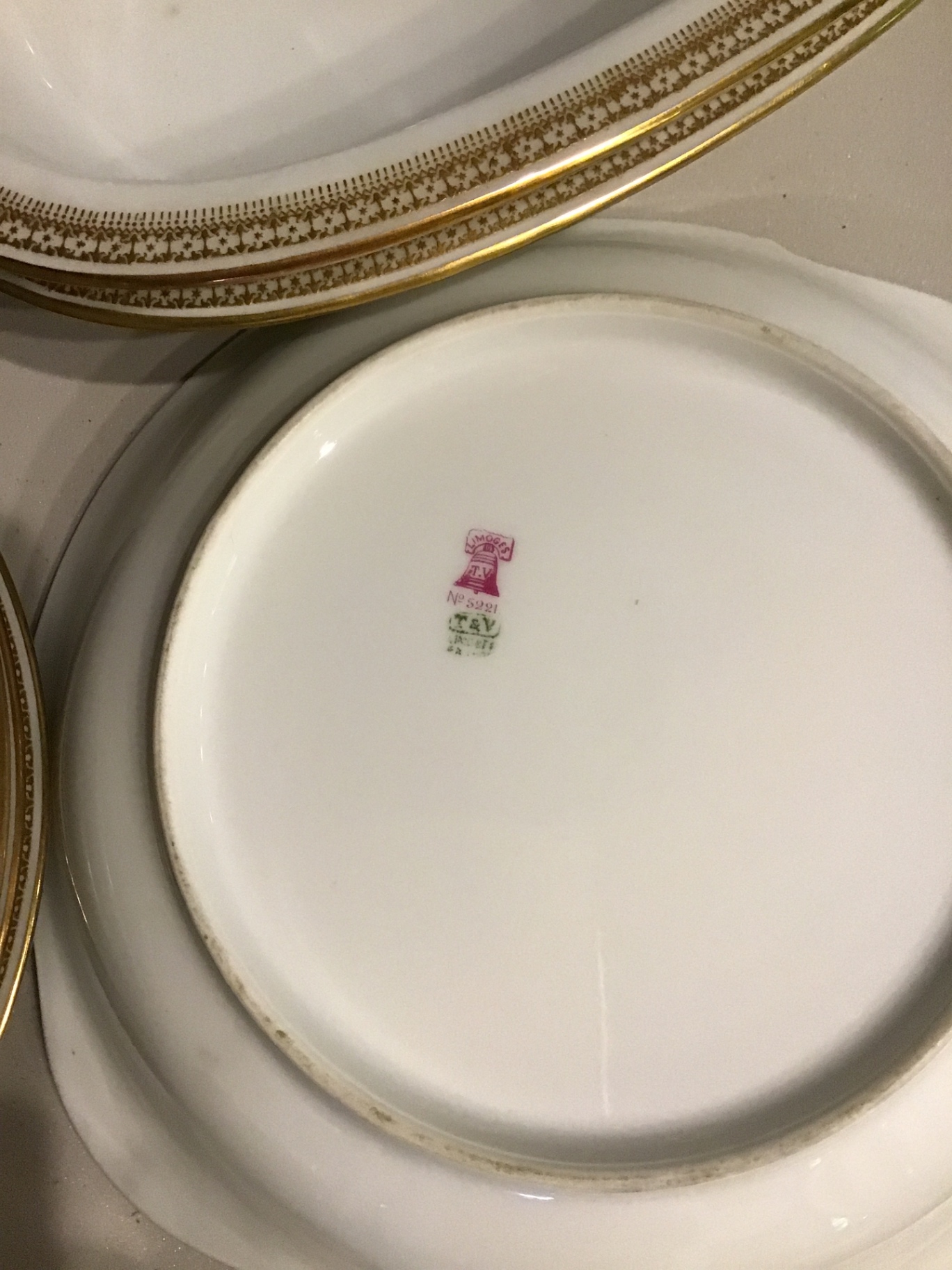 White Limoges porcelain dinnerware set with gold trim and serving pieces - image 3 of 3