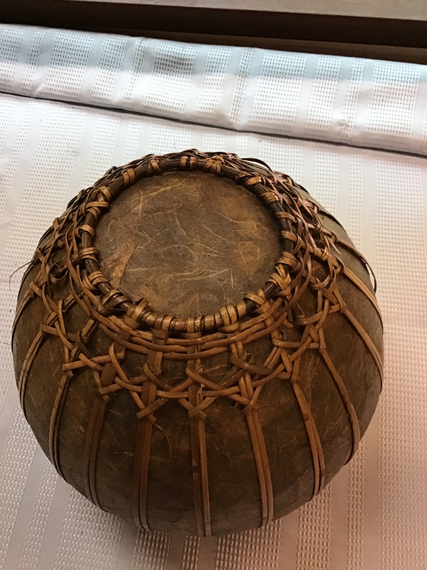 Round ceramic pot wrapped in woven rattan - image 3 of 4