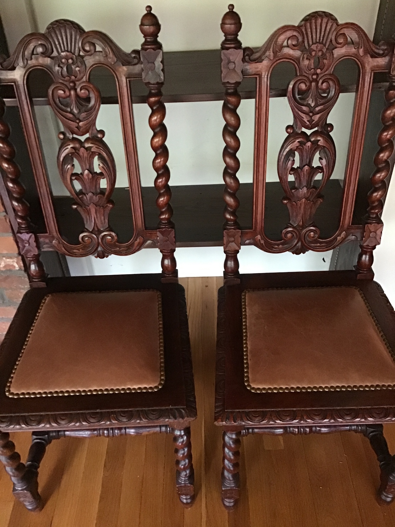 4 Ornate carved wooden dining chairs with leather seats $500minimum bid - image 1 of 3