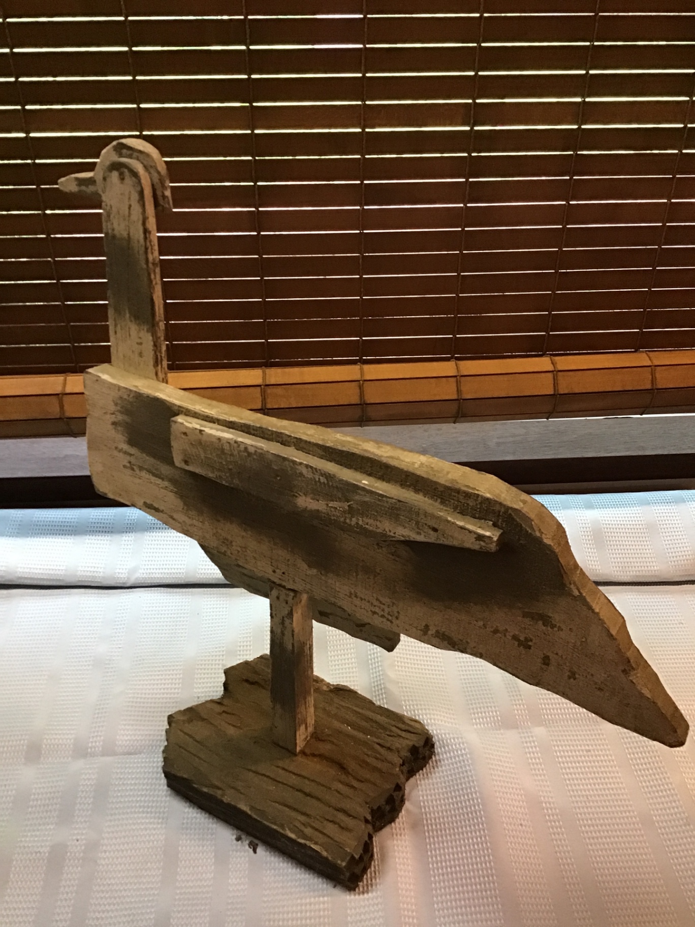 Rustic wooden duck sculpture on a stand - image 3 of 3