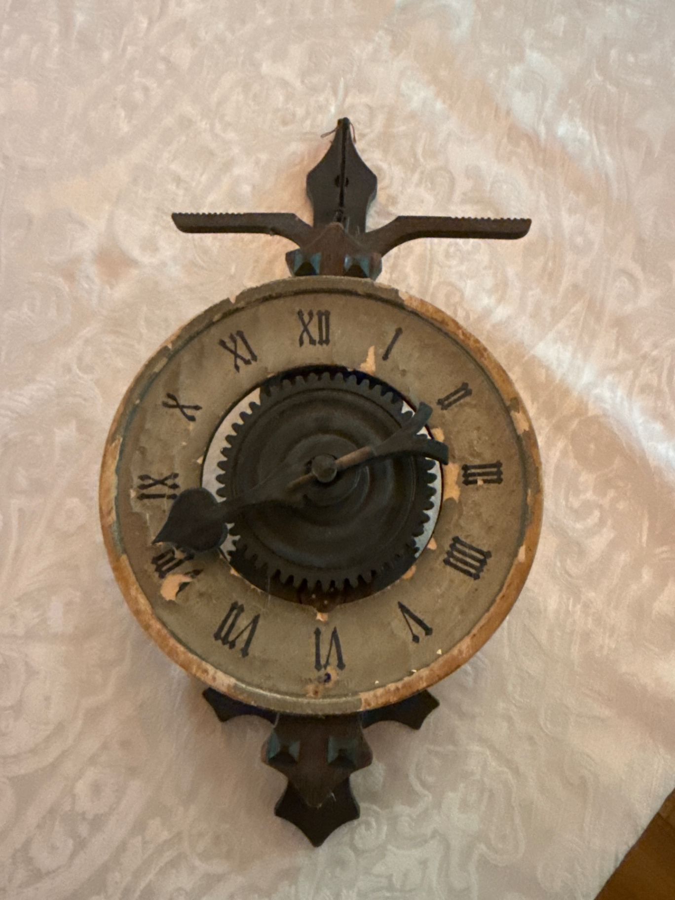 Antique mechanical clock movement with exposed gears - image 1 of 3
