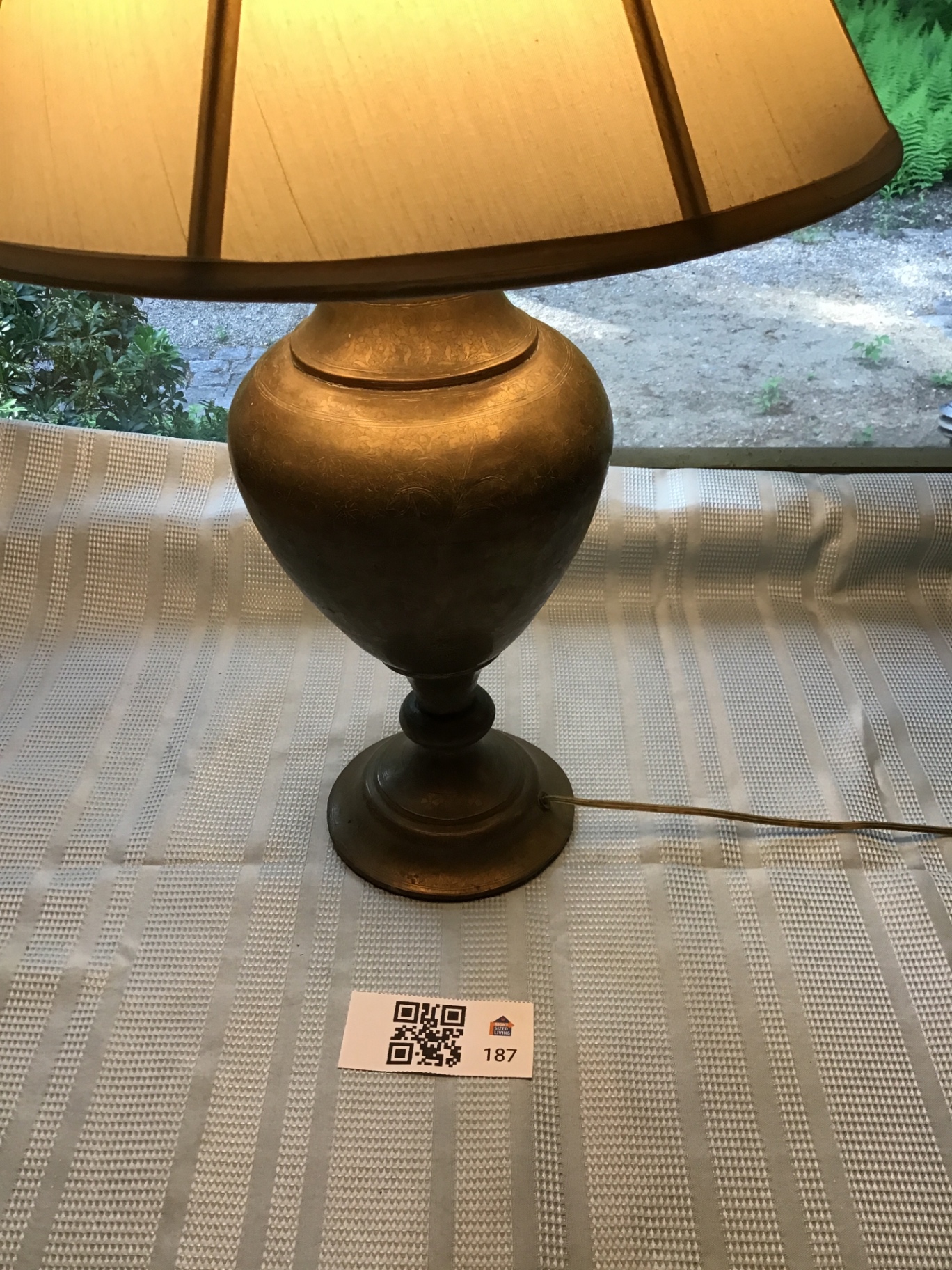 Table lamp with urn-shaped base and fabric shade - image 1 of 4